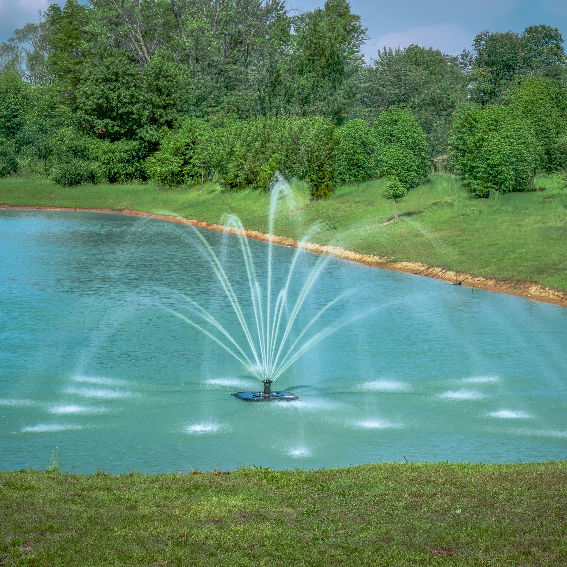 Classic floating pond fountain with wide fan, vertical plume, and multi-tier spray patterns for residential and commercial ponds