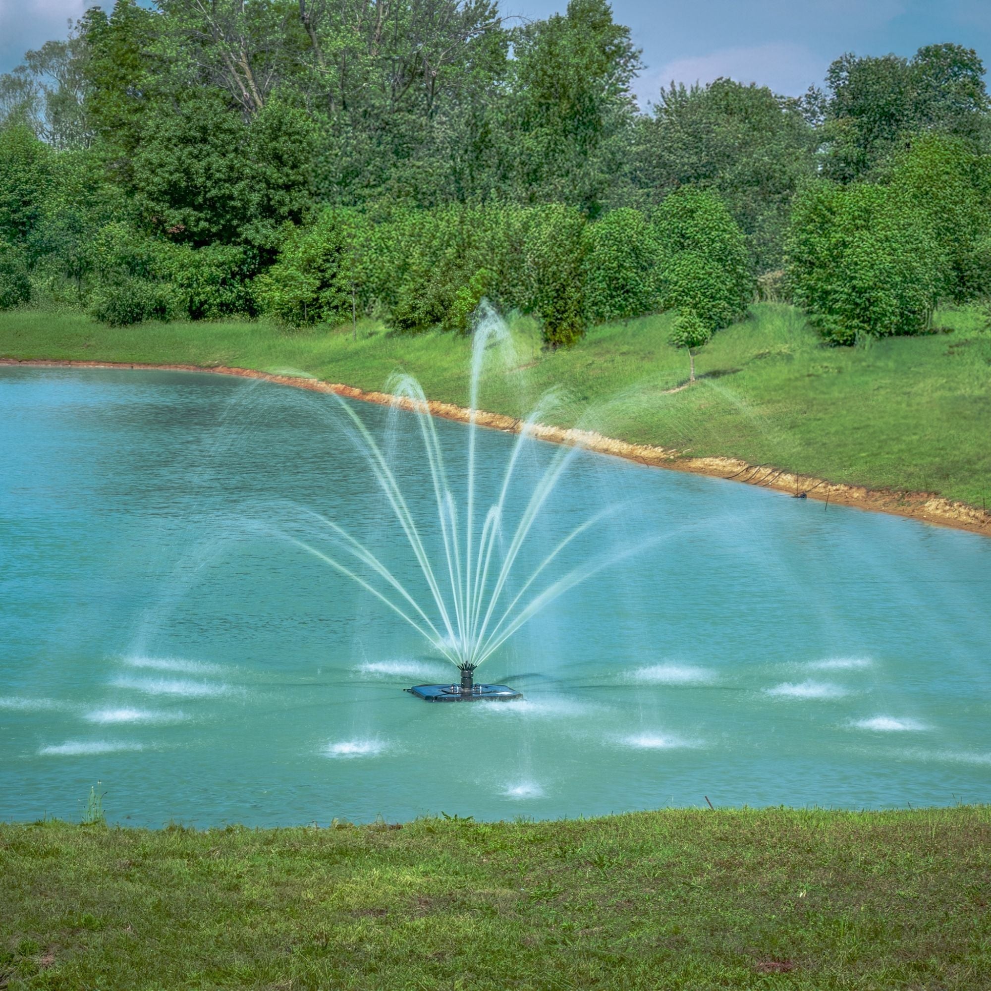 Classic floating pond fountain with wide fan, vertical plume, and multi-tier spray patterns for residential and commercial ponds