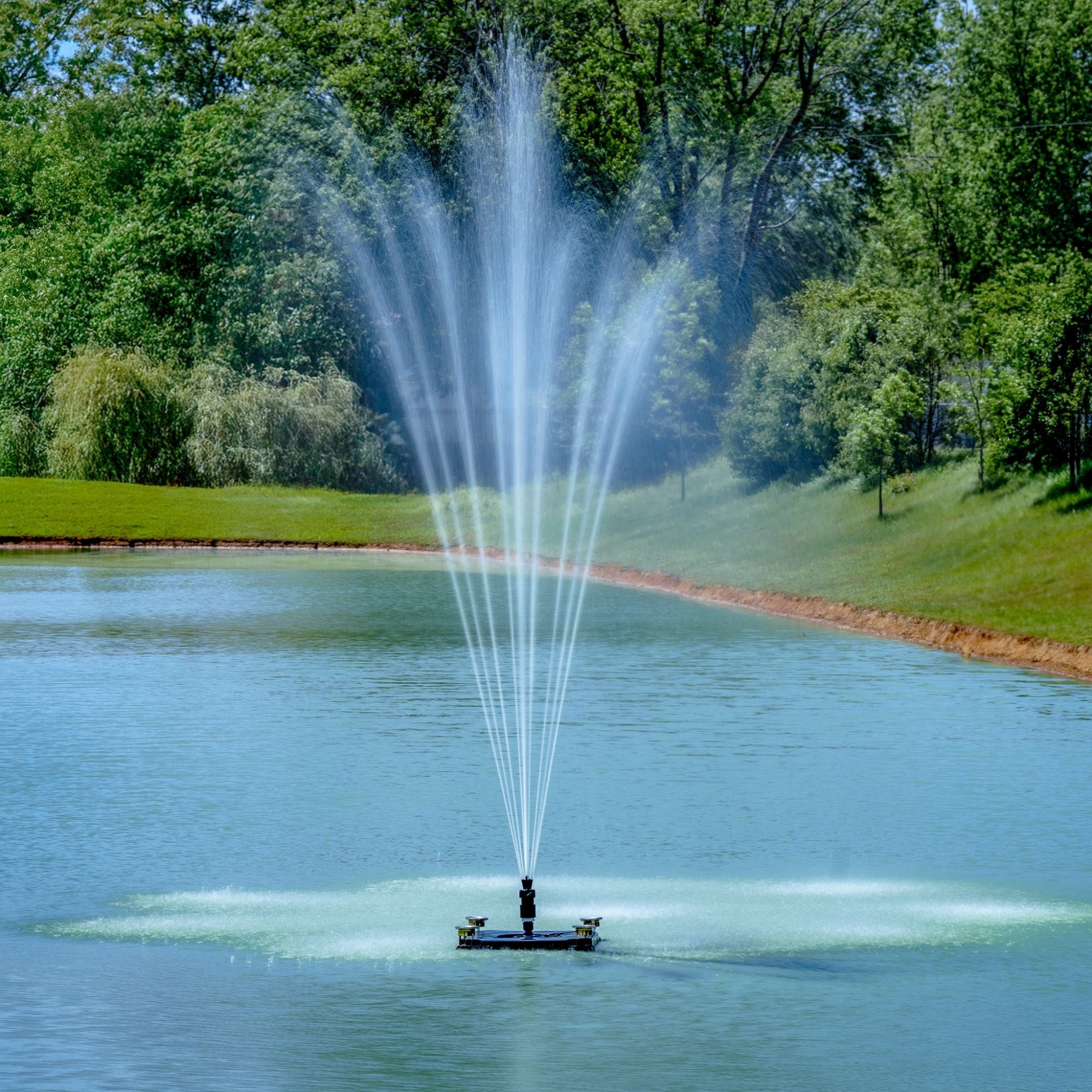 Classic floating pond fountain with wide fan, vertical plume, and multi-tier spray patterns for residential and commercial ponds