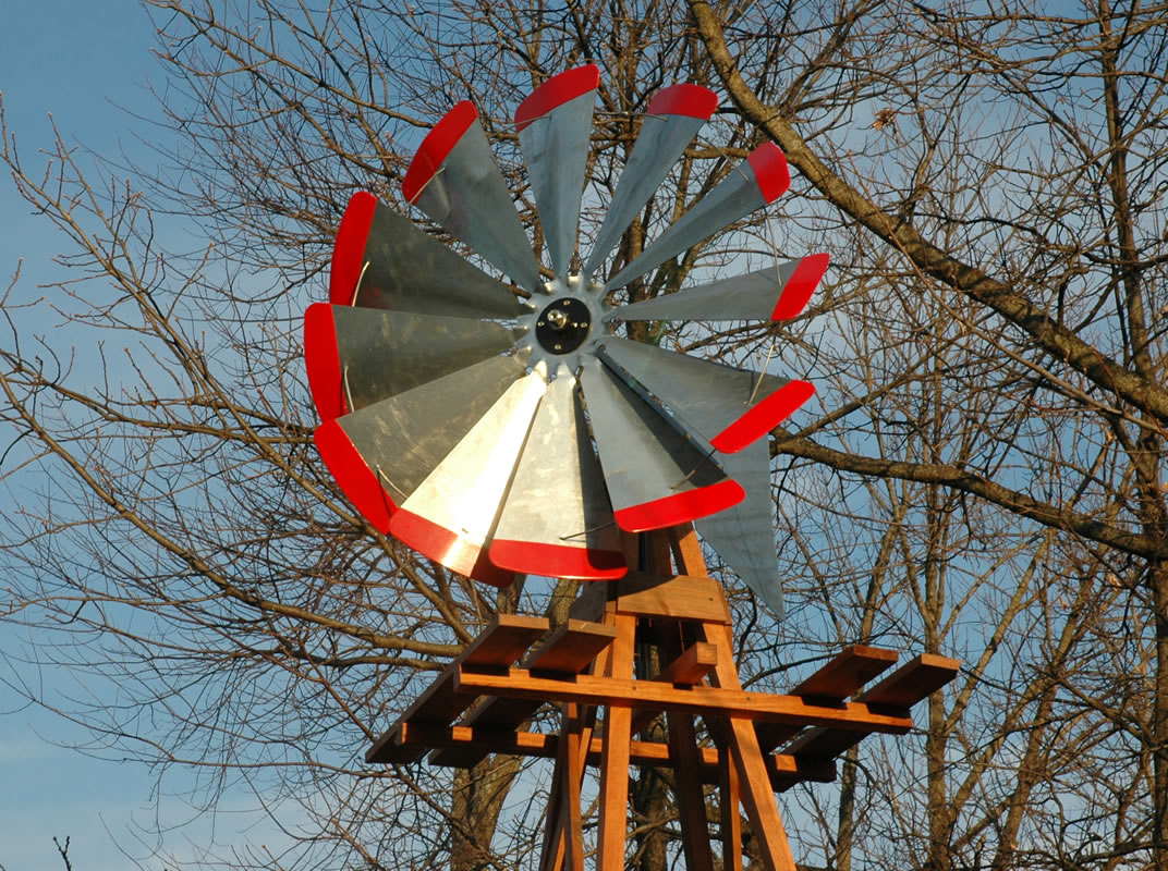 Garden Windmill Head Assembly with 30-inch red-tipped fan, complete replacement head for Outdoor Water Solutions wooden garden windmills, built for durability and smooth rotation.