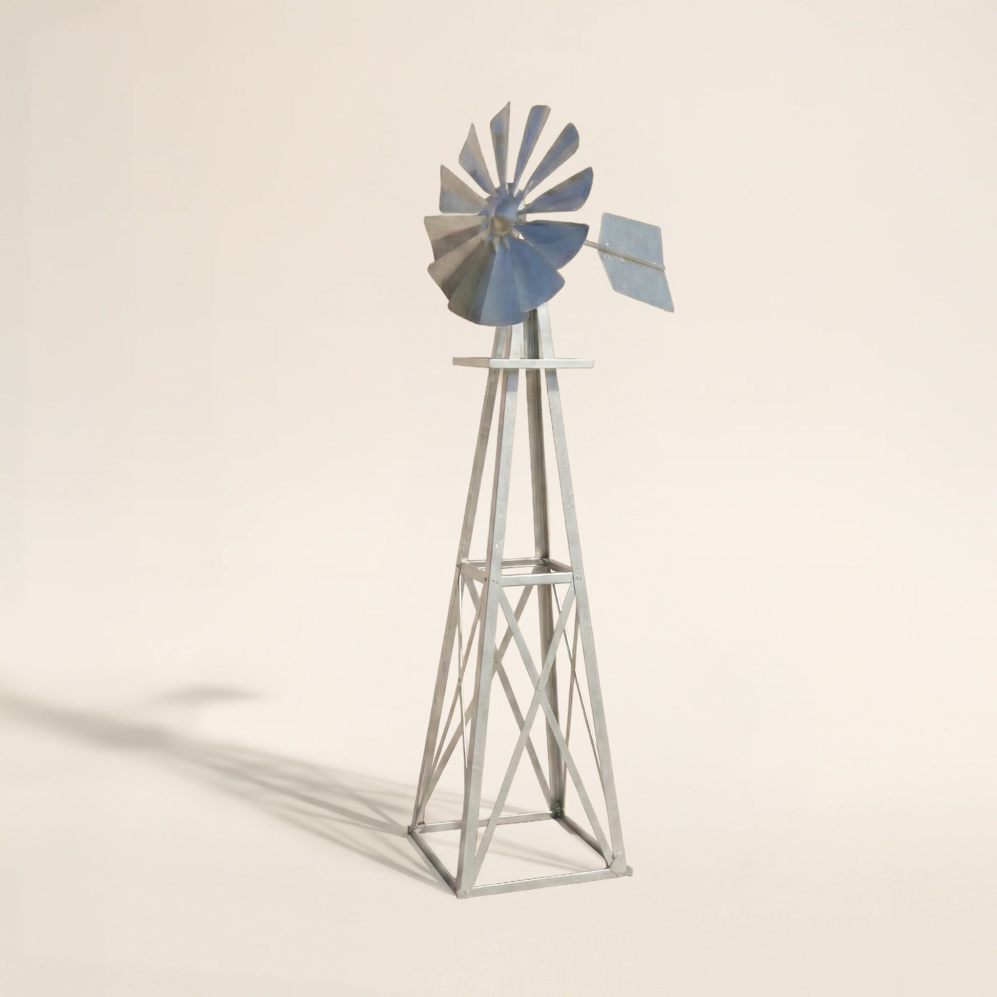 Steel Garden Windmill for Yard with galvanized steel construction, smooth rotating blades, and classic farm-style design