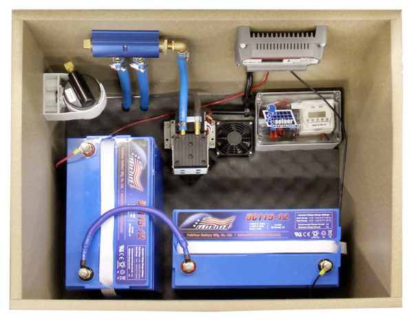 Interior of an aeration kit with two batteries.