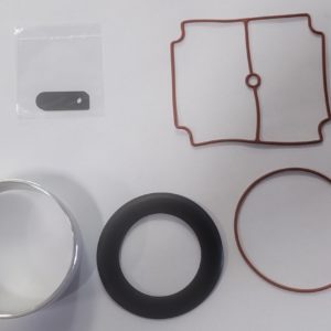 Matala Replacement 1/4 HP Rocking Piston Maintenance Kit. Two round gaskets. One thin and red, one thicker and black. Metal sleeve. Metal spacer. Rectangular red gasket.