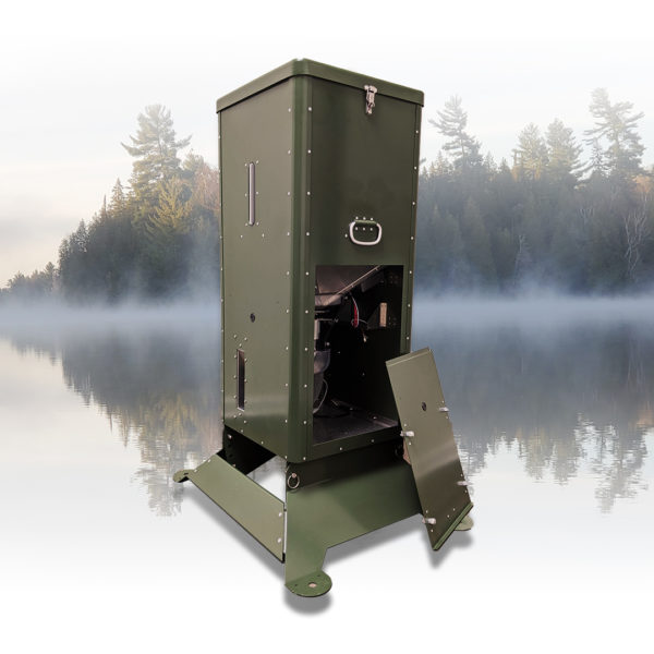 The H125 Fish Feeder against a background with fog, trees, and water.