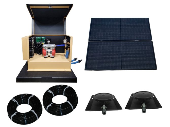 Image of a TurboAir II system with the tan cabinet, two rolls of air hose, two bases and a large solar panel.